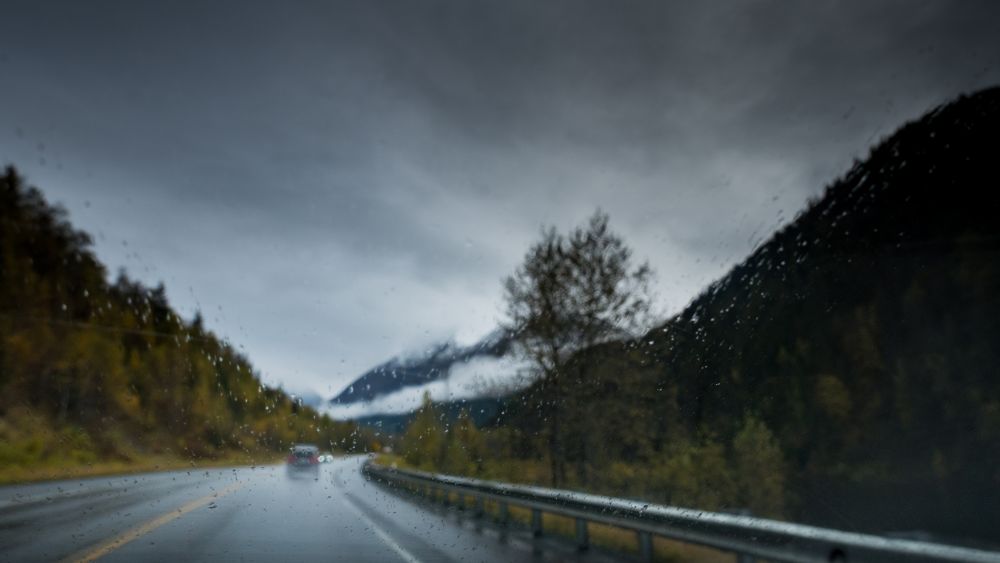 rainy mountain road driving